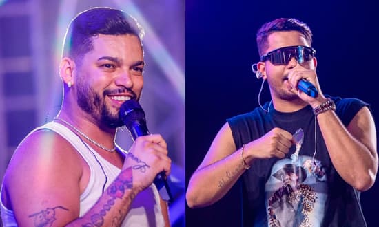 Show de forró com palco iluminado durante festa junina em praça pública em Sergipe