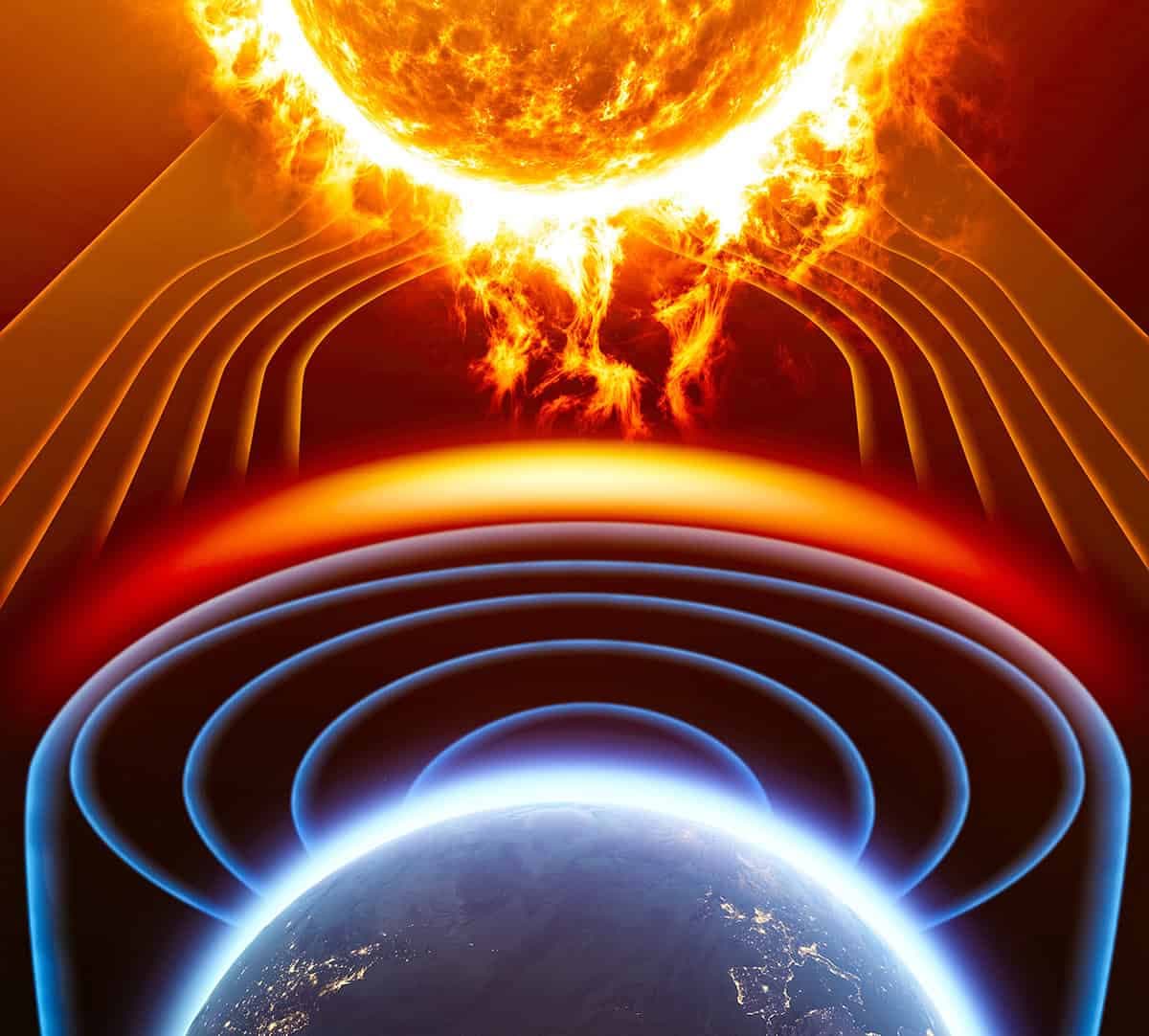 Os "cinturões de Van Allen" armazenam partículas de radiação de alta energia, atuando como uma barreira que protege a Terra dos ventos solares emitidos por explosões no Sol. Crédito: Naeblys - Shutterstock