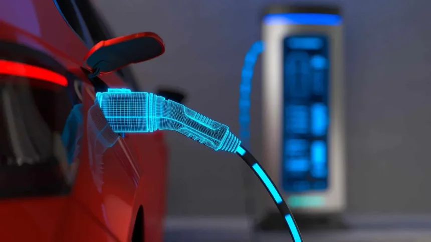 Carro Elétrico Carregando / Crédito: Es Sarawuth (Shutterstock/Reprodução)