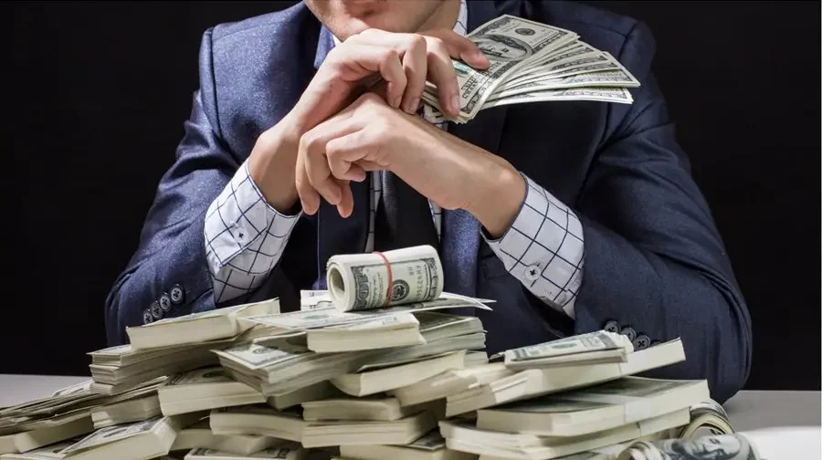 Dolar-Dinheiro-Dolares-Notas.webp
